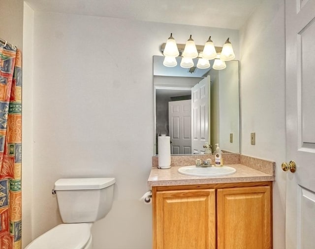 501 Lexington St Unit 105, Waltham, MA 02452 - bathroom featuring vanity and toilet