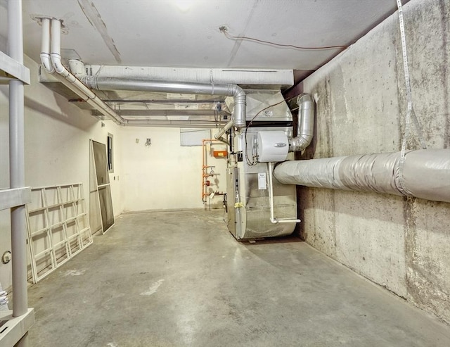 501 Lexington St Unit 105, Waltham, MA 02452 - unfinished below grade area with heating unit