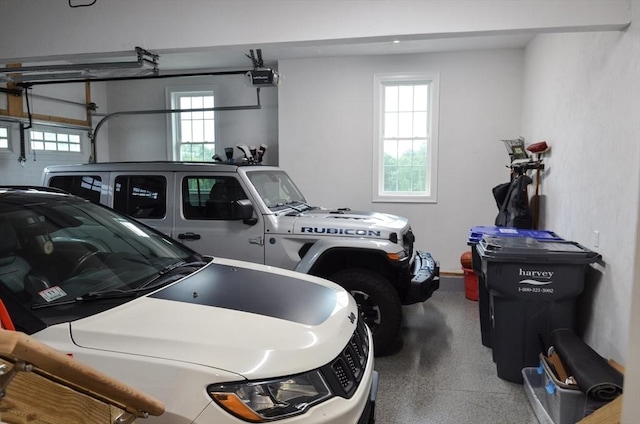 garage featuring a garage door opener