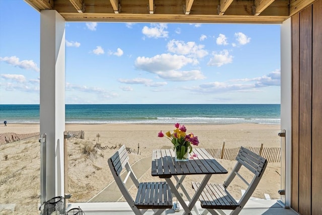 exterior space featuring a beach view