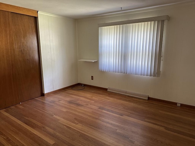 47 Mayfair St, East Longmeadow, MA 01028 - unfurnished bedroom featuring wood finished floors and a closet