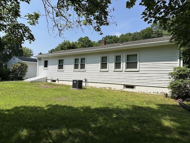 47 Mayfair St, East Longmeadow, MA 01028 - rear view of property featuring a yard and a chimney