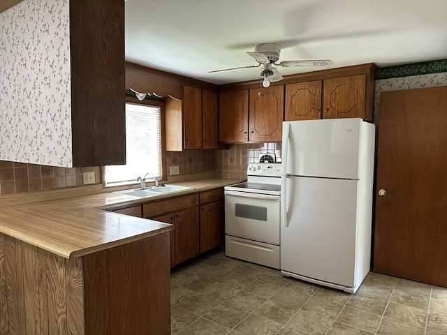47 Mayfair St, East Longmeadow, MA 01028 - kitchen with white appliances, decorative backsplash, a peninsula, and light countertops