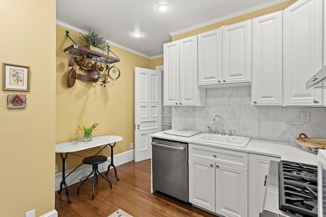 kitchen featuring dishwasher, a sink, light countertops, backsplash, and white cabinetry
