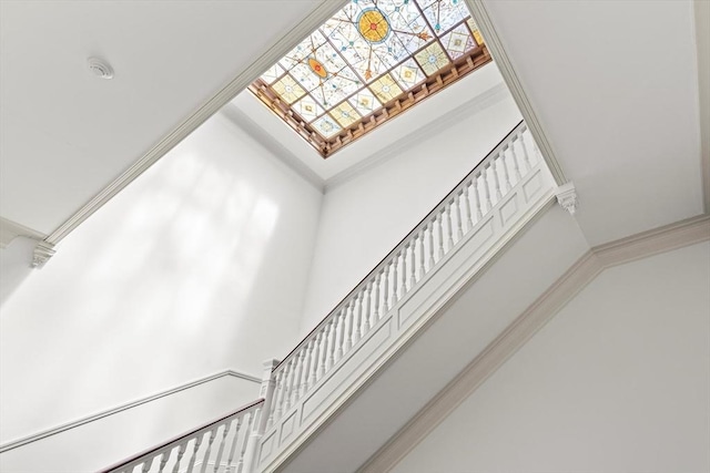 stairs featuring ornamental molding