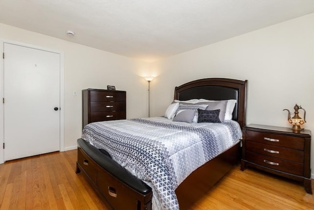 bedroom with light hardwood / wood-style floors