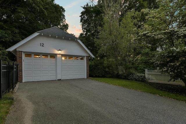 12 Coolidge Ave, Lexington, MA 02420 - garage at dusk with a garage