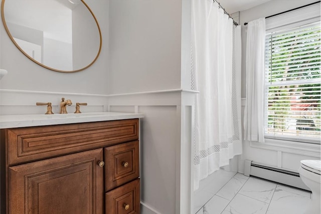 61 Elm St Unit 61, Andover, MA 01810 - full bath featuring baseboard heating, marble finish flooring, vanity, plenty of natural light, and a wainscoted wall