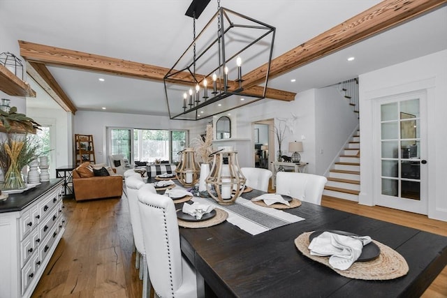 30 Indian Cove Rd, Marion, MA 02738 - dining room featuring beam ceiling, wood finished floors, stairway, recessed lighting, and a chandelier