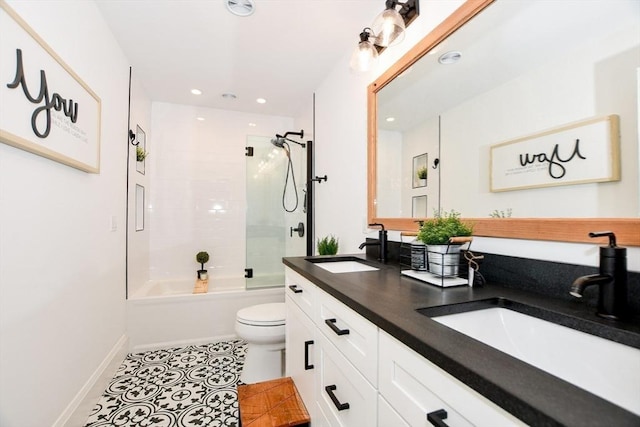 30 Indian Cove Rd, Marion, MA 02738 - full bathroom featuring toilet, double vanity, shower / washtub combination, tile patterned flooring, and baseboards