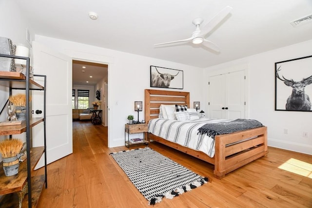 30 Indian Cove Rd, Marion, MA 02738 - bedroom with light wood-type flooring, baseboards, a closet, and a ceiling fan