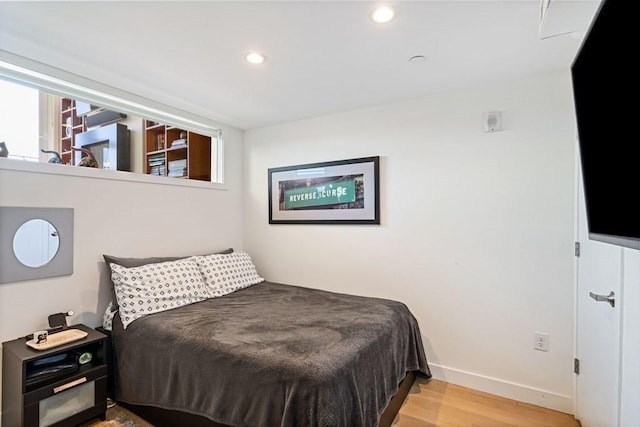288 Marginal St Unit 4, Boston, MA 02128 - bedroom featuring wood finished floors, recessed lighting, and baseboards