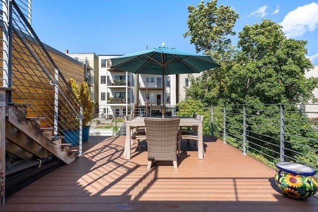 288 Marginal St Unit 4, Boston, MA 02128 - wooden terrace with outdoor dining area