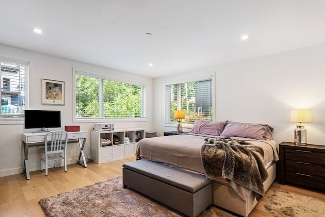 288 Marginal St Unit 4, Boston, MA 02128 - bedroom with light wood-type flooring, recessed lighting, baseboards, and an office area