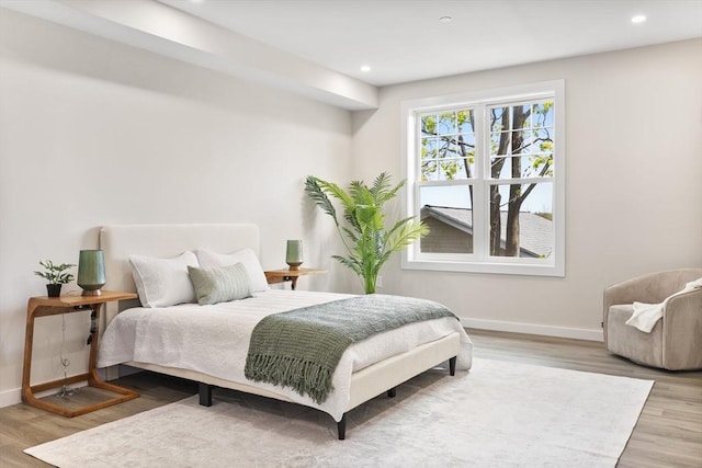 43-47 Fremont Unit 7, Boston, MA 02126 - bedroom featuring baseboards, recessed lighting, and wood finished floors