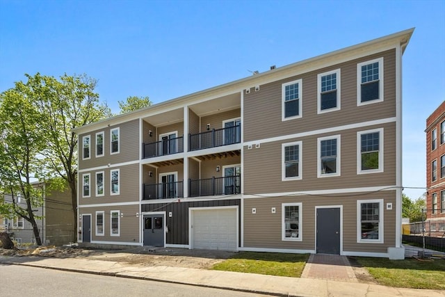 43-47 Fremont Unit 7, Boston, MA 02126 - view of property featuring an attached garage