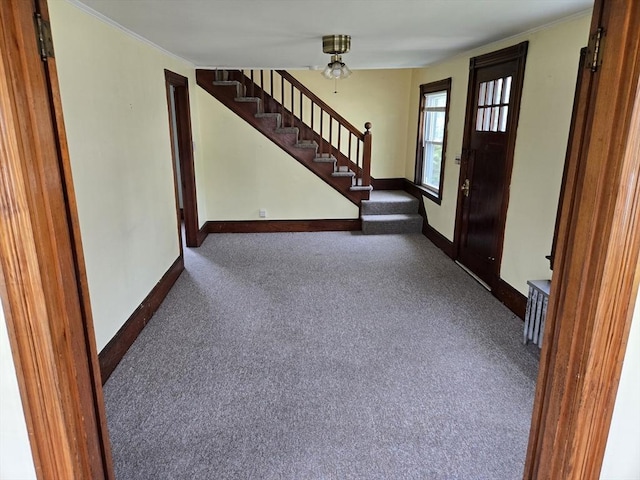 43 Jefferson St, Taunton, MA 02780 - foyer entrance with carpet flooring, stairway, and baseboards