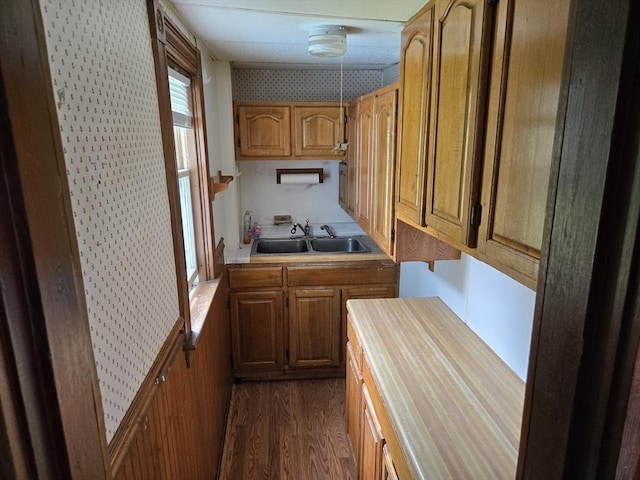 43 Jefferson St, Taunton, MA 02780 - kitchen with a sink, dark wood-style floors, and wallpapered walls