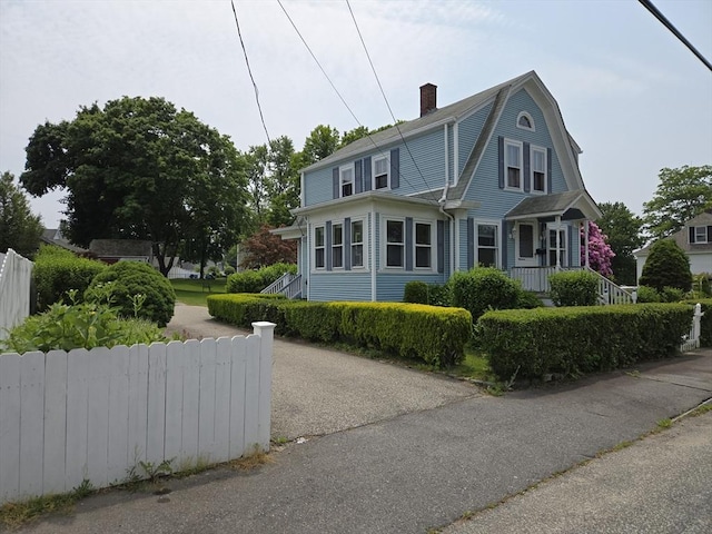 43 Jefferson St, Taunton, MA 02780 - view of front facade featuring a chimney and a gambrel roof