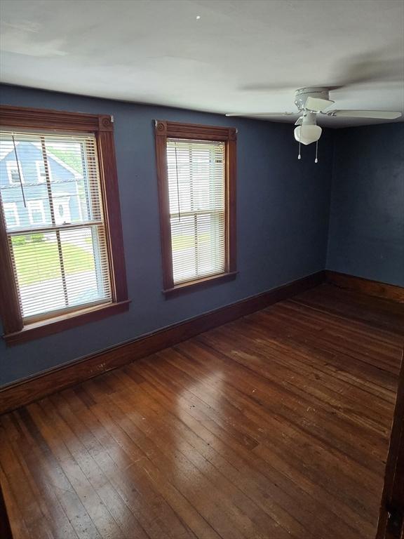 43 Jefferson St, Taunton, MA 02780 - empty room featuring hardwood / wood-style floors, baseboards, and a ceiling fan