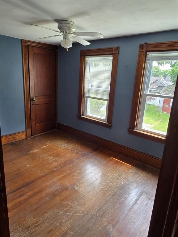 43 Jefferson St, Taunton, MA 02780 - empty room with hardwood / wood-style floors, baseboards, and a ceiling fan