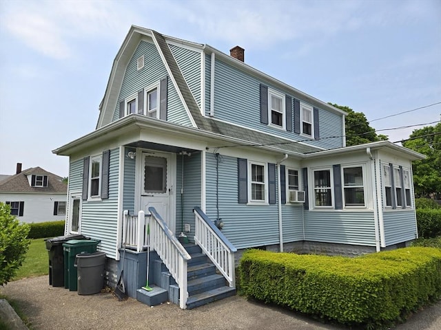 43 Jefferson St, Taunton, MA 02780 - colonial inspired home featuring a chimney, a gambrel roof, and cooling unit