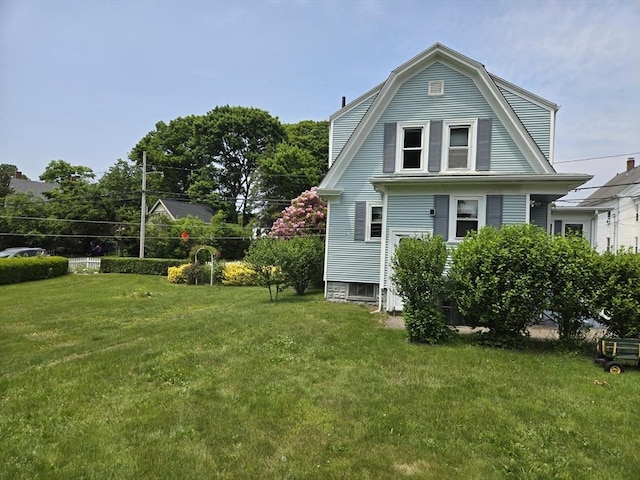 43 Jefferson St, Taunton, MA 02780 - view of side of property featuring a yard and a gambrel roof