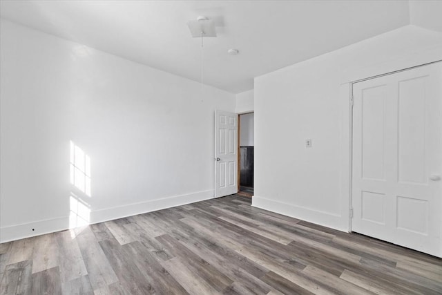 unfurnished room featuring wood-type flooring