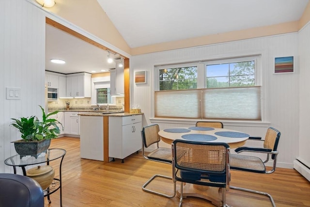 304 Hunting Rd, Needham, MA 02494 - dining space featuring light wood-style floors, lofted ceiling, and baseboard heating