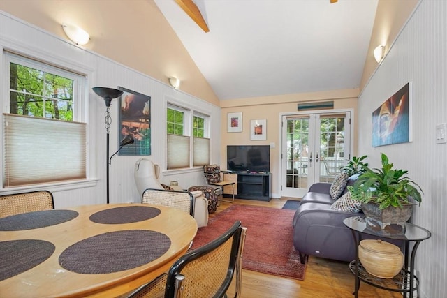 304 Hunting Rd, Needham, MA 02494 - living room featuring lofted ceiling, wood finished floors, french doors, and healthy amount of natural light
