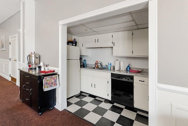 73 Broad Reach Unit T77C, Weymouth, MA 02191 - kitchen with dishwasher, freestanding refrigerator, light countertops, a drop ceiling, and wainscoting