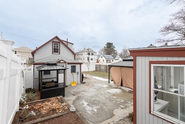 view of patio / terrace with an outbuilding