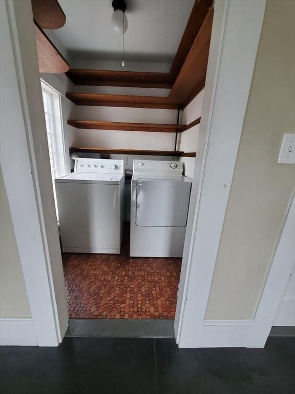 laundry area with independent washer and dryer