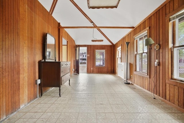 7 Crescent Pl, Wareham, MA 02558 - entrance foyer with wood walls, light flooring, and vaulted ceiling