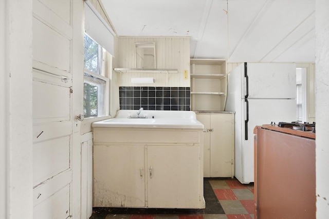 7 Crescent Pl, Wareham, MA 02558 - kitchen featuring freestanding refrigerator, dark flooring, open shelves, and gas range