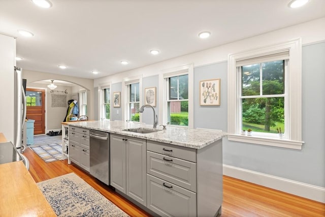 965 Greenville Ave, Smithfield, RI 02828 - kitchen with dishwasher, gray cabinets, arched walkways, light wood finished floors, and recessed lighting
