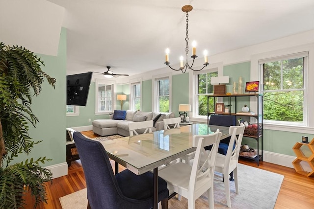965 Greenville Ave, Smithfield, RI 02828 - dining room featuring a chandelier, wood finished floors, and a ceiling fan