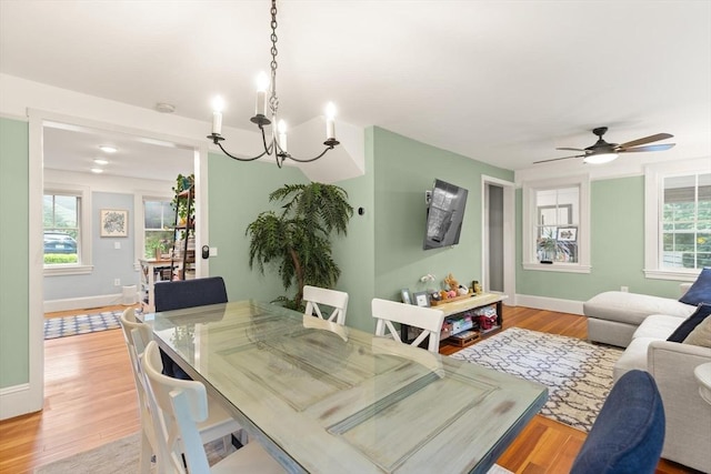 965 Greenville Ave, Smithfield, RI 02828 - dining area with a chandelier, light wood finished floors, and ceiling fan