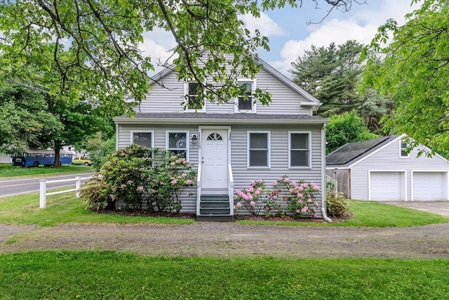 15 Ryan Rd, Northampton, MA 01062 - view of front facade featuring entry steps, an outbuilding, and a detached garage