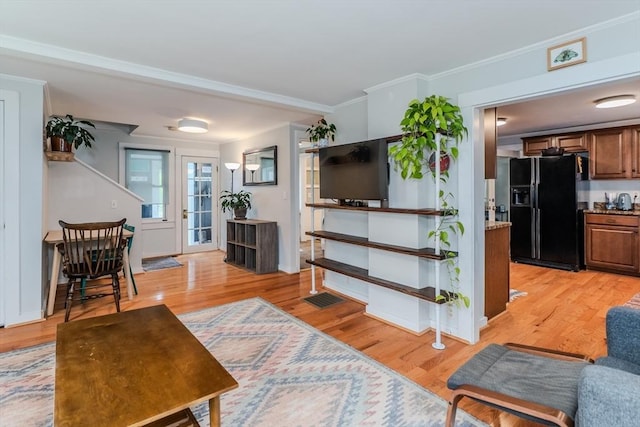 15 Ryan Rd, Northampton, MA 01062 - living room featuring light wood-style floors and crown molding