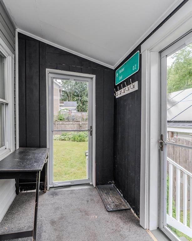 15 Ryan Rd, Northampton, MA 01062 - doorway to outside with carpet floors, healthy amount of natural light, vaulted ceiling, and ornamental molding