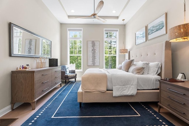 27 Richardson Dr Unit 27, Millis, MA 02054 - bedroom featuring wood finished floors, ceiling fan, and a raised ceiling