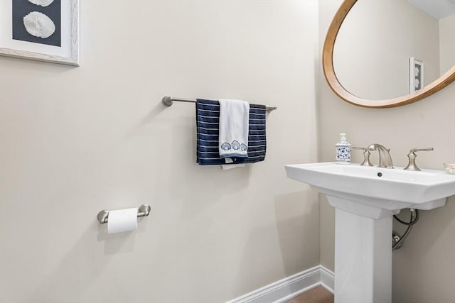 27 Richardson Dr Unit 27, Millis, MA 02054 - bathroom featuring baseboards and a sink