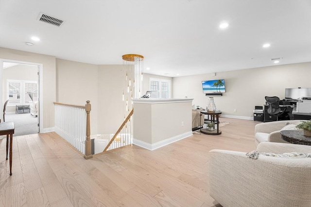 27 Richardson Dr Unit 27, Millis, MA 02054 - living room featuring wood finished floors, plenty of natural light, and recessed lighting