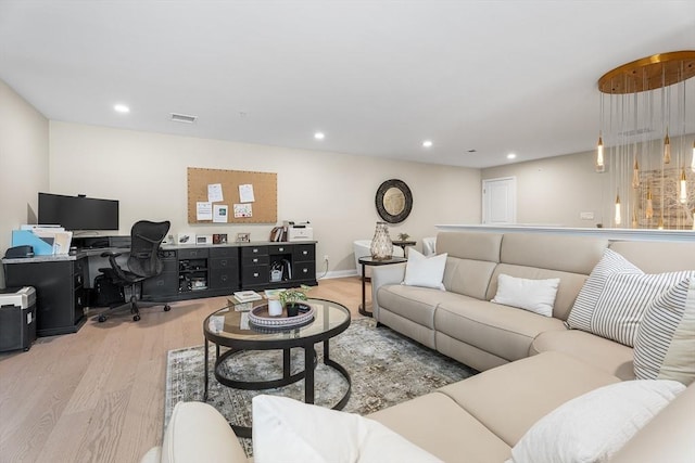 27 Richardson Dr Unit 27, Millis, MA 02054 - living area featuring a desk, wood finished floors, and recessed lighting