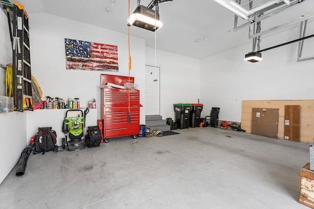 27 Richardson Dr Unit 27, Millis, MA 02054 - garage featuring a garage door opener