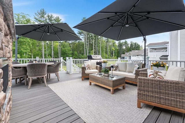 27 Richardson Dr Unit 27, Millis, MA 02054 - wooden deck featuring an outdoor hangout area, outdoor dining space, and a grill