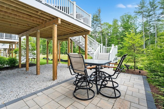27 Richardson Dr Unit 27, Millis, MA 02054 - view of patio featuring outdoor dining space, a deck, and stairway