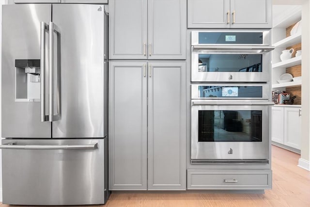 27 Richardson Dr Unit 27, Millis, MA 02054 - kitchen with stainless steel appliances and light wood finished floors