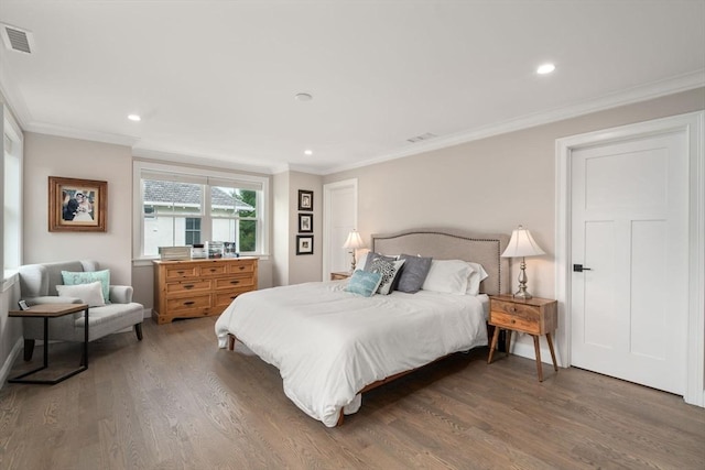 94 Webster Unit 94, Newton, MA 02465 - bedroom with wood finished floors, crown molding, recessed lighting, and baseboards